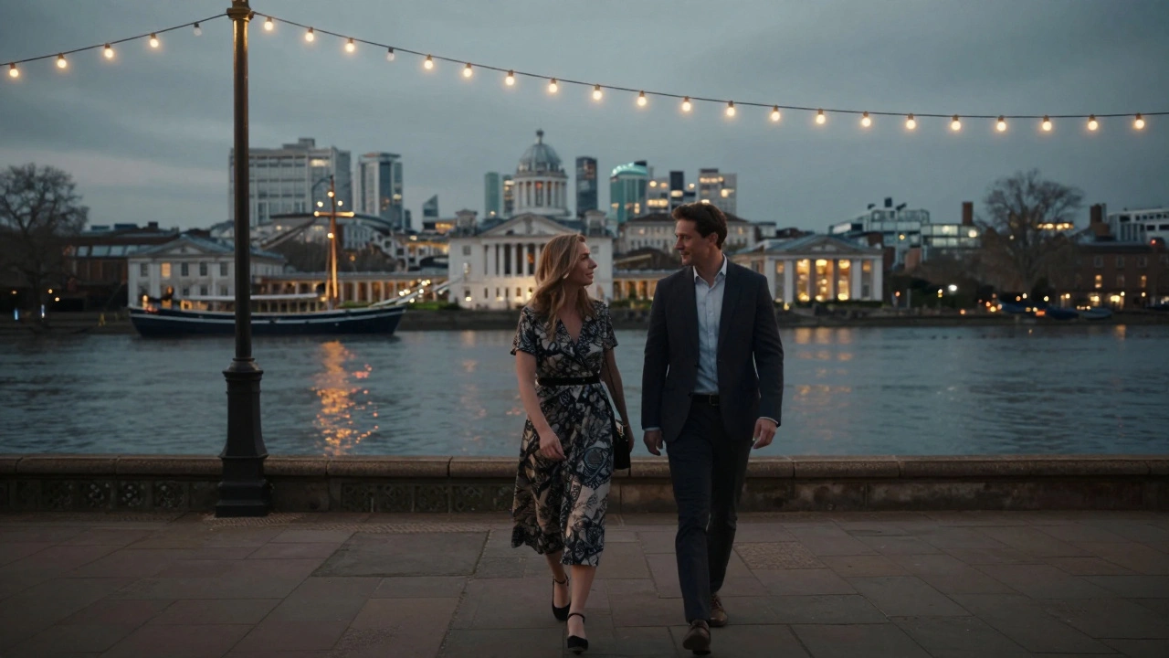 A well-dressed couple walks calmly along the Thames at night near Cutty Sark, enjoying quiet companionship under soft lights.