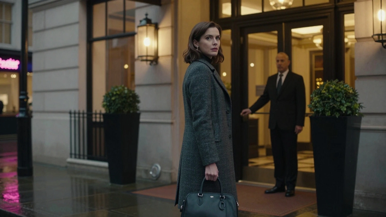 Woman standing outside a luxury hotel in London at dusk, looking back cautiously.